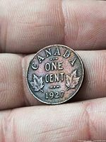 Reverse of 1927 Canada one-cent coin showing denomination and date