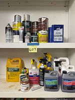 Top shelf showing assorted aerosol finishes, wood stain quart cans and acetone