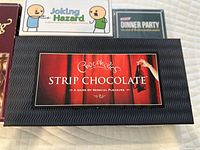 Strip Chocolate, Joking Hazard box top, Ridley’s Dinner Party box