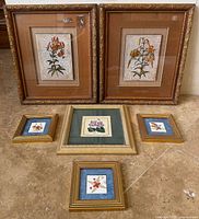 Group shot of all six framed floral artworks