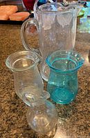Group shot of all four glass pieces
