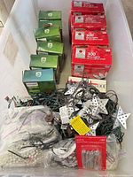 overview bin with boxed lights, star strand, hangers, beads