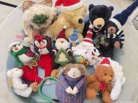 Group shot showing entire assortment of plush toys and antler headband inside storage tote