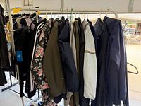 Rack with multiple jackets in various colours and patterns