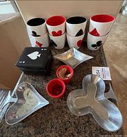 Group shot of cups, bowls, coasters, card case