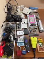 Overview of all electronics and accessories spread on table