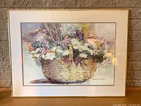 Front view of framed floral print showing entire artwork, matting and frame