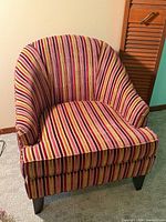 Front view of striped tub chair