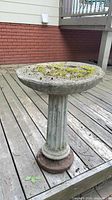 Overall view of concrete garden pedestal