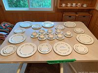All dinnerware pieces arranged on table