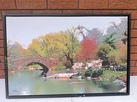 Front view of framed canvas landscape artwork