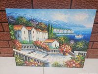 Front view of signed coastal oil painting