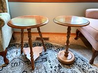 both wooden side tables shown together