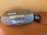 Front view of Sony boombox and Sports Walkman