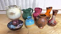 Group shot of all eight pottery pieces