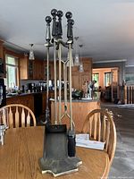 Complete fireplace tool set on stand