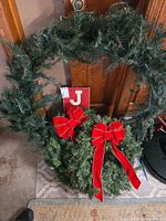 Wreath, garland and JOY sign grouped together