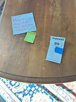 Top view showing maple surface, notes and sale tag
