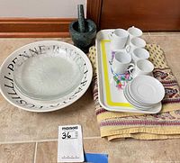 Group shot of all serveware and tablecloth