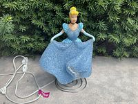 Full view of Cinderella popcorn night light with cord and base
