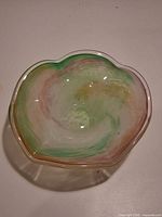 top view of multicolor swirled art glass bowl