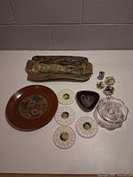 All 12 decorative pieces laid out on table