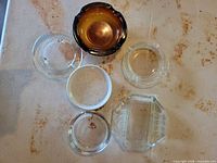 All six ashtrays laid out