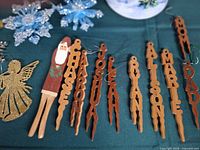 group of wooden name icicle ornaments, wooden Santa, glitter angel and blue snowflakes