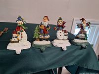 All four stocking holders on table