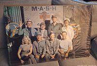 Full view of the M*A*S*H poster showing entire image and mounting board