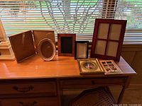 All eight frames on desk