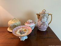 Group view of all four porcelain pieces