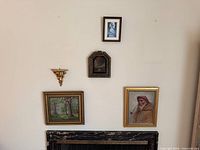 All five wall accents hung together