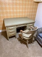 Front angled view of desk and matching chair