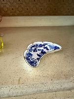 Top view of Royal Crown Derby Blue Mikado crescent dish