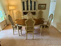 dining set front view showing table and six chairs
