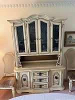 Full view of hutch showing upper glass doors and lower drawers