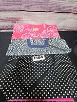 Three stacked totes showing all patterns