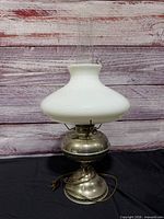 Full view of converted hurricane lamp with milk glass shade and chimney