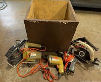 All power tools and wooden box overview