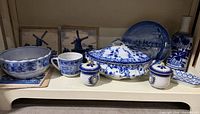 Group shot of all blue & white ceramic items on shelf