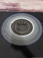 Top view showing spiral rings and blue rim