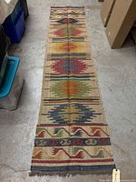 Full view of wool flatweave kilim runner rug