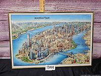 Full view of framed Manhattan poster
