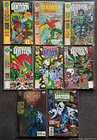 All eight Green Lantern Corps Quarterly issues laid out, covers visible
