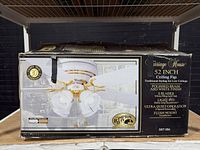 Box showing Hampton Bay Carriage House 52-inch ceiling fan details
