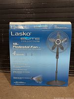 Front of retail box showing Lasko Elite Collection 18 in pedestal fan