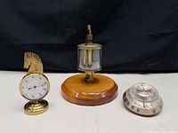 Group view of lubricator, horse-head thermometer and round thermostat
