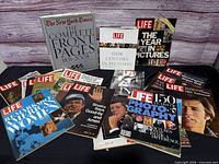 All items laid out showing NYT box, LIFE books and multiple LIFE magazines