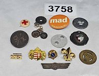 Full group layout showing all pins, badges, buttons and charms